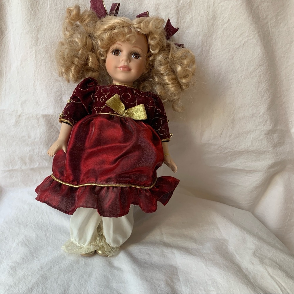 Classic Red and Gold Girls' Porcelain Doll - Elegant Holiday Dress